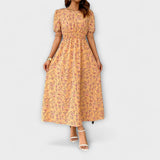 Amelia - Mekko pyöreällä kaula-aukolla ja kukkakuosisella