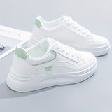 Tyylikkäät valkoiset sneakersit kevyellä mukavuudella