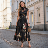 Elsa - Laskostettu midi-mekko kukkakuvioinnilla