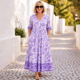 Elly | Elegantti Kukallinen Mekko, jossa on Rentouttava Tunnelma
